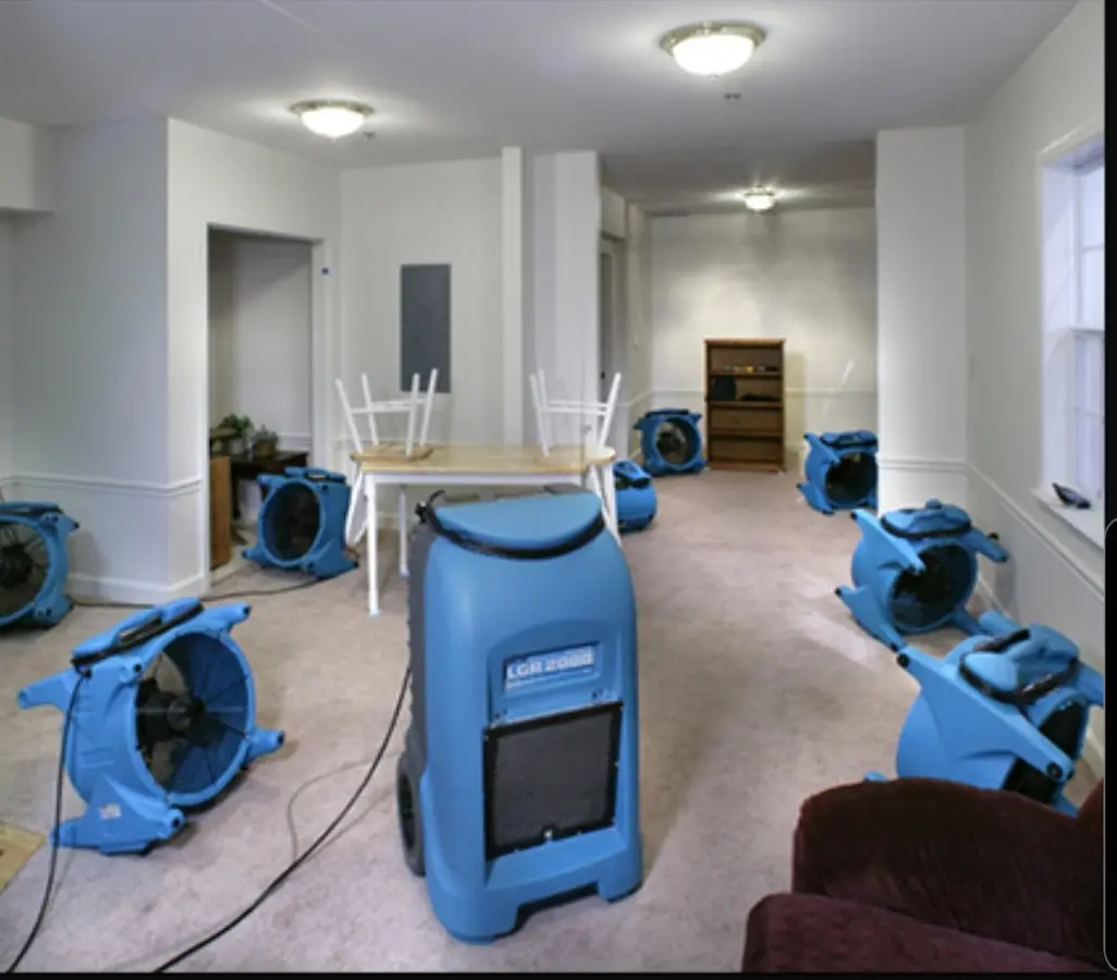 Air movers and dehumidifier setup for Water Damage Restoration in Fayetteville